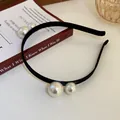 Elegante cerchietto nero vintage in stile francese con grandi perle bianche lucide - Perla Tonda Nera