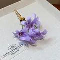 Elegant detail showing soft purple fabric flowers on a gold-toned floral hair fork - Hair Stick (8#)