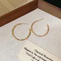 Minimalist 18k gold-plated circular hoop earrings with elegant minimalist aesthetic - 3cm / Gold