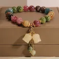 Elegant bohemian multi-color beaded bracelet with cream stone tulip charms on jewelry box - 25# Bracelet - Colorful