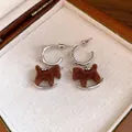 Silver-tone rocking horse earrings with brown flocked finish in a jewelry box - Hoop Flocked Horse (48#)