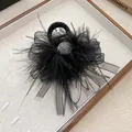 Elegant black feather hair claw clip with mesh ribbon and rhinestone centerpiece - Black With Ribbon