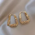 Eleganti orecchini a cerchio a U placcati in oro con pietre di zircone per donna - Fibbia per orecchio a forma di U / Oro