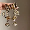 Elegant gold floral tassel earrings with pearls for a stylish bohemian holiday look. - 24# Silver Pin-Gold