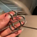 Elegant silver oversized twisted heart hoop earrings for women, stylish minimalist jewelry - Heart Line (HE8275) / Silver