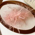 Close-up of elegant pink ostrich feather hair claw clip on minimalist wooden tray - 5# Claw Clip