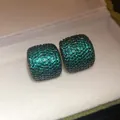 Macro detail of elegant green zircon square stud earrings with shimmering pave setting. - Pave C-Shape Style (10#)