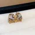 Detailed view of 18k gold plated earrings featuring a sparkling leopard zircon pattern inlay - Leopard Pattern Square Hoop