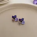 Elegant purple flower earrings with rhinestone accents and dark blue cube details - Flower Style / Purple