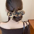 Leopard print hair scrunchie featuring a black bow and gold charm for retro styling - Leopard Bow Scrunchie (57#) / 1 Piece / Brown