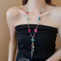 Detailed view of a vintage bohemian necklace with colorful glass beads on a female model - 4# Necklace - Multi-color
