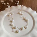 Close-up detail of a double-strand necklace featuring elegant pearls and glass beads - 23# Necklace - Gold & White - 12mm Artificial Pearl