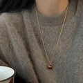 Detailed view of a Maillard style tiger eye stone pendant necklace on a cozy brown sweater - 18# Necklace - Gold - Coffee - Gold Plated