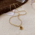 Elegant gold-tone beaded necklace featuring an oval tiger eye stone pendant in Maillard style - 22# Necklace - Gold