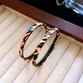Stylish vintage hoop earrings featuring minimalist leopard print and silver needle design - Classic Hoop (12#)