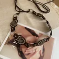 Western style brown leather belt featuring heart rivets and metal ring links for women. - Heart Rivet Ring Lace-up (HN10257)