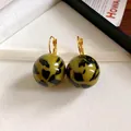 Vintage leopard print ball drop earrings with elegant golden hooks on white background - Round Ball Lever-back (28#)