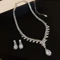 Detailed close-up of elegant French style water-drop zircon necklace and earrings set - Necklace And Earrings (Silver)