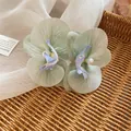 Elegant light green satin orchid flower hair clip with pearl detail - Green Orchid - Duckbill Clip