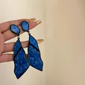 Blue irregular geometric dangle earrings shown with unique crinkled acrylic texture - Blue Earrings
