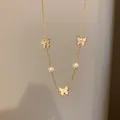 Elegant gold butterfly and pearl pendant necklace with shimmering crystal accents - Style 36 (Real Gold Plated)