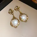 Elegant vintage palace style drop earrings featuring large faux pearls and crystal accents - 31# Silver Earring Post Earrings