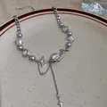 Elegant silver tassel necklace featuring irregular light blue pearls and star charms - Star Star Pearl Element Style