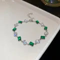 Elegante pulsera plateada con piedras de circón geométricas en verde esmeralda y blanco - Estilo 47# Plateado Verde y Blanco