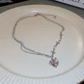 Elegant pink heart gemstone necklace featuring star links and a sparkling rhinestone chain. - Pink Heart Star Double Layer Style