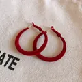 Elegant red flocked hoop earrings with silver pins for autumn and winter fashion style - Red