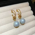Elegante goldene C-Knoten-Ohrringe mit irisierenden blauen Perlenanhängern - 45# C-Shape Knot Sphere Bead Style / Gold/Hellblau