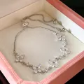 Close-up of elegant zircon flower adjustable bracelet presented in a pink luxury gift box - Bracelet (WB145) / Silver