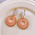 Handcrafted pink thread woven round drop earrings with a stylish white enamel oval stud - Clip-on Earrings / Pink