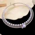 Detail of multi-layer choker necklace with elegant faux pearls and sparkling zirconia stones - Silver