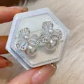 Close-up detail of French style flower pearl earrings with sparkling zircon petals - Elegant Flower (WE5690) / 925 Silver Needle / Silver