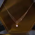 Elegant three-strand gold-tone necklace featuring a classic single white pearl pendant - Mesh Triple Layer Necklace (17#)