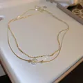 Elegant double-layered gold necklace with iridescent pearl and faceted snake chain - Pearl Geometric Double Layer Necklace (18#)