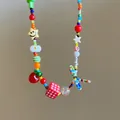 Handmade colorful Y2K beaded necklace featuring smiley star, red dice, and strawberry charms - Y2K Dopamine Cartoon Beaded Necklace / Colorful