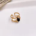 Detailed view of a gold-plated stainless steel open ring with a black oval zircon - 30# Ring - Gold - Black