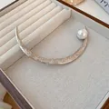 Elegant silver crescent hair pin with engraved cloud patterns and a lustrous white pearl - Silver Pearl Pattern Moon Shape