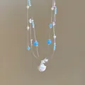 Multi-layer dopamine necklace with light blue beads, pearls, and a silver shell pendant. - Ocean Shell Style / Silver-Blue-Shell