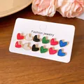 Macro view of 12-piece colorful enamel heart-shaped stud earrings on jewelry card - Heart Style (HE28357) / 12-Piece Set / Gold Multicolor