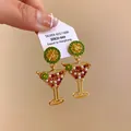 Detailed shot of cocktail glass earrings with rhinestones and lime slice design - Lime Cocktail Glass Style / 925 Silver Needle / Gold-Green-Pink