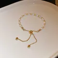 Élégant bracelet en perles blanches vintage avec une chaîne ajustable en or doré - Style Ajustable Perle 5mm (11#) / Or-Blanc