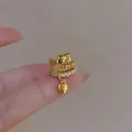Gold layered ear cuff set with zircon stones and heart pendant on finger - Ear Clip (HE10168) / Single Piece / Gold