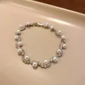 Bracelet élégant en argent avec perles blanches et zircons cubiques brillants - Style de Zirconia Perle Ondulée (14#) / Argent