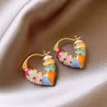 Detailed view of gold colorful heart enamel hoop earrings with vibrant striped pattern. - Heart Geometric Style (Multicolor) / Ear Buckle-Colorful