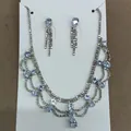 Elegant vintage silver-tone necklace and earrings set featuring blue teardrop rhinestones - Water Drop Lace Tassel Jewelry Set / Silver