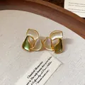 Orecchini a perno a petalo vintage dorati con finitura in smalto crema e verde - Ago 54# Argento - Oro - Verde (autentica Placcatura In Oro)