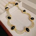 Collier géométrique vintage en or avec pierres noires ovales style cour royale chic - 36# Collier Vintage Oval Noir / Or
